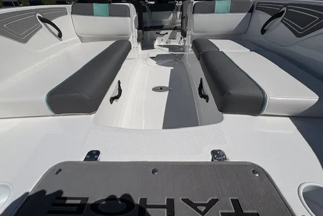 Slide: The Image of Interior view of 2027 Tahoe T21 boat with sleek seating and modern design. - 2