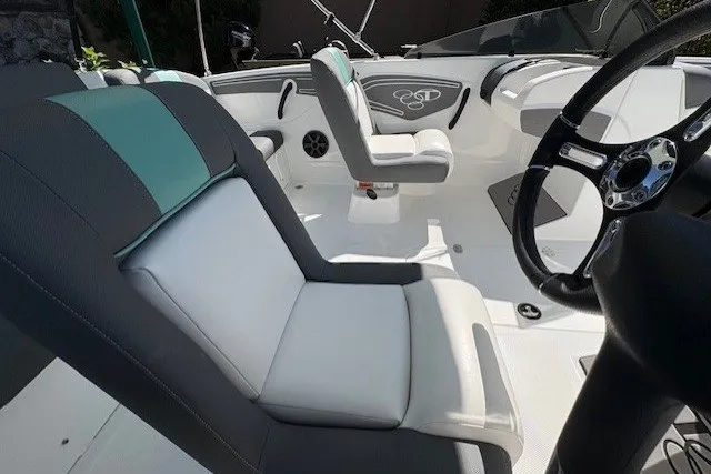 Slide: The Image of Interior of a 2027 Tahoe T21 boat with modern seating and steering wheel. - 4