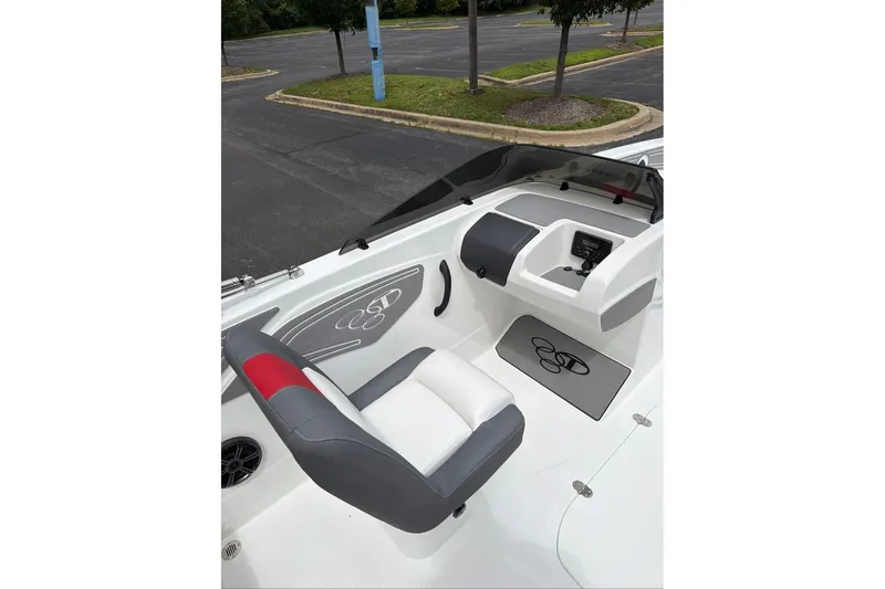 Slide: The Image of Interior of 2027 Tahoe T21 boat featuring sleek seating and modern dashboard design. - 10