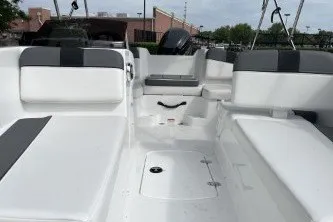 Slide: The Image of 2027 Tahoe T16 boat interior with white seating and modern design. - 6