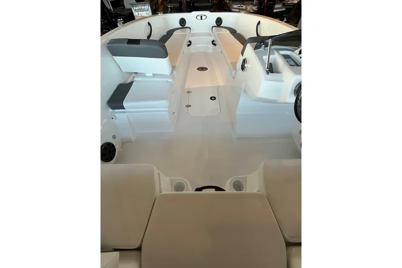 Slide: The Image of 2027 Tahoe T18 boat interior with seating and steering console. - 6