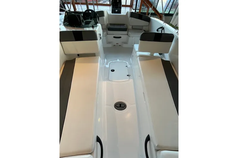 Slide: The Image of 2027 Tahoe T18 boat interior with cushioned seating and sleek design. - 8