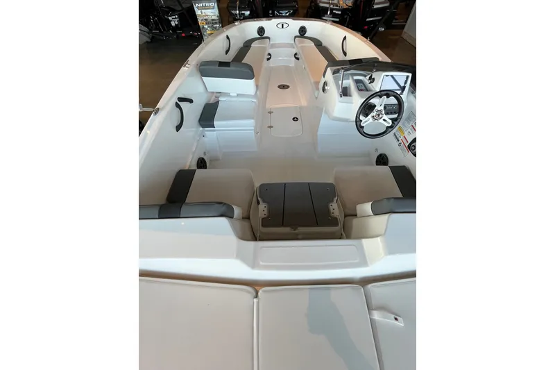 Slide: The Image of 2027 Tahoe T18 boat interior with seating and steering console. - 3