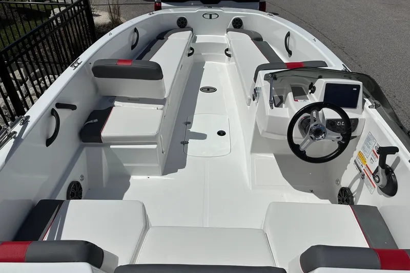 Slide: The Image of 2027 Tahoe T18 boat interior with seating, steering wheel, and control panel. - 3