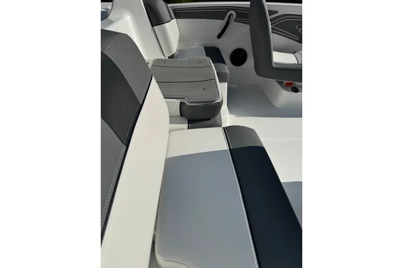 Slide: The Image of Interior seating of 2027 Tahoe T21 boat, featuring sleek black and white upholstery. - 5