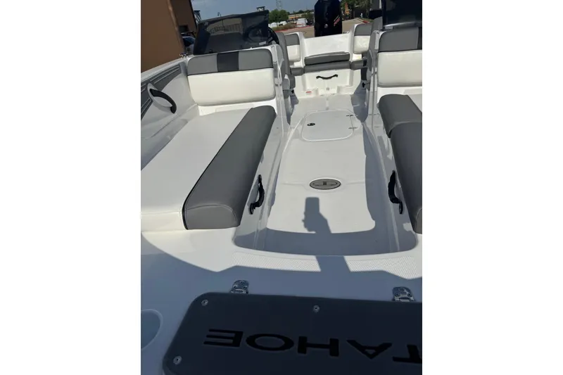 Slide: The Image of 2027 Tahoe T21 boat interior with gray and white seating, spacious layout. - 7