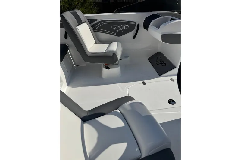 Slide: The Image of 2027 Tahoe T21 boat interior with sleek white and gray seating design. - 6
