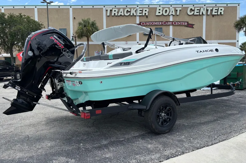 Slide: The Image of 2027 Tahoe T18 boat on trailer at Tracker Boat Center. - 1