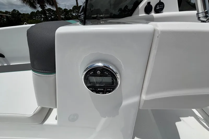 Slide: The Image of 2027 Tahoe T18 boat dashboard with control panel and sleek design. - 15
