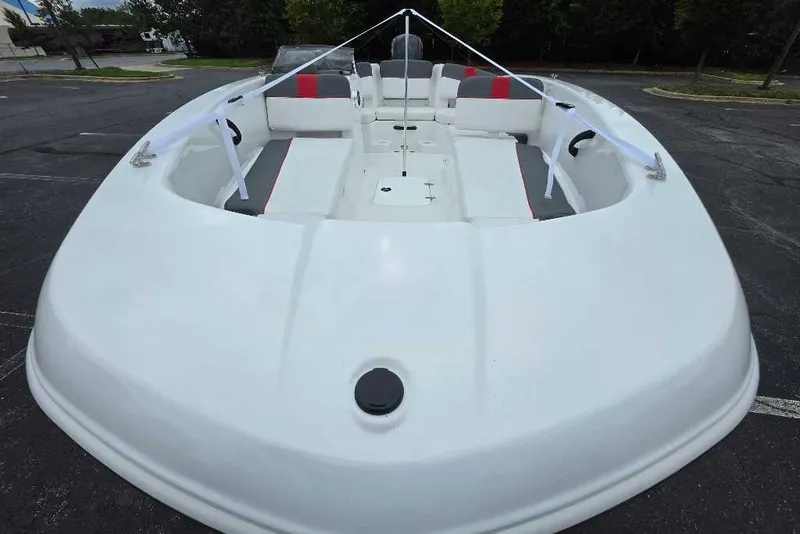 Slide: The Image of 2027 Tahoe T18 boat with spacious seating and sleek design. - 7