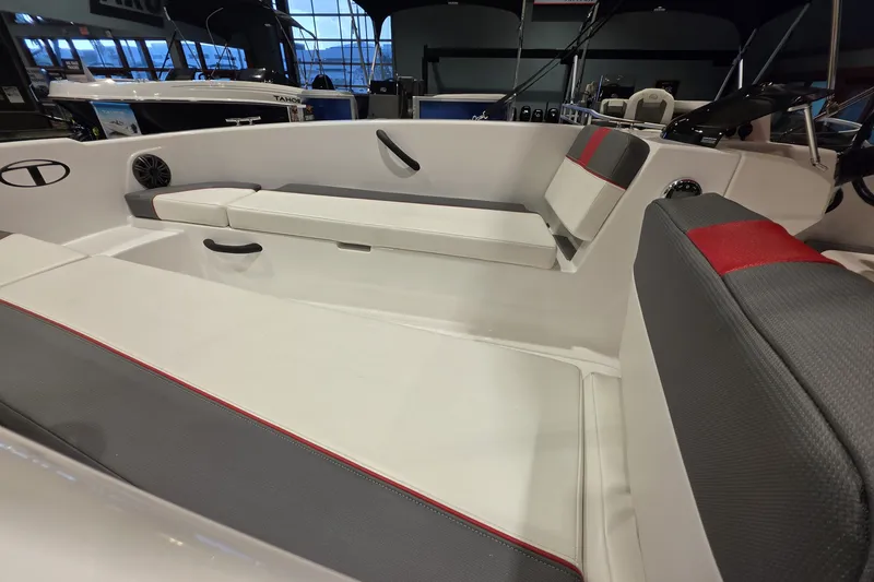 Slide: The Image of Interior of 2027 Tahoe T18 boat with cushioned seating and modern design. - 6