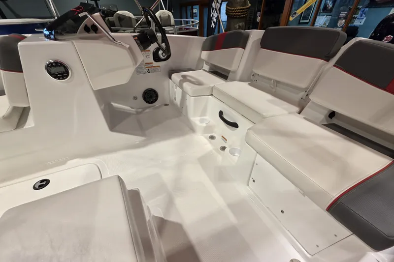 Slide: The Image of Interior of 2027 Tahoe T18 boat with white and gray seating. - 3