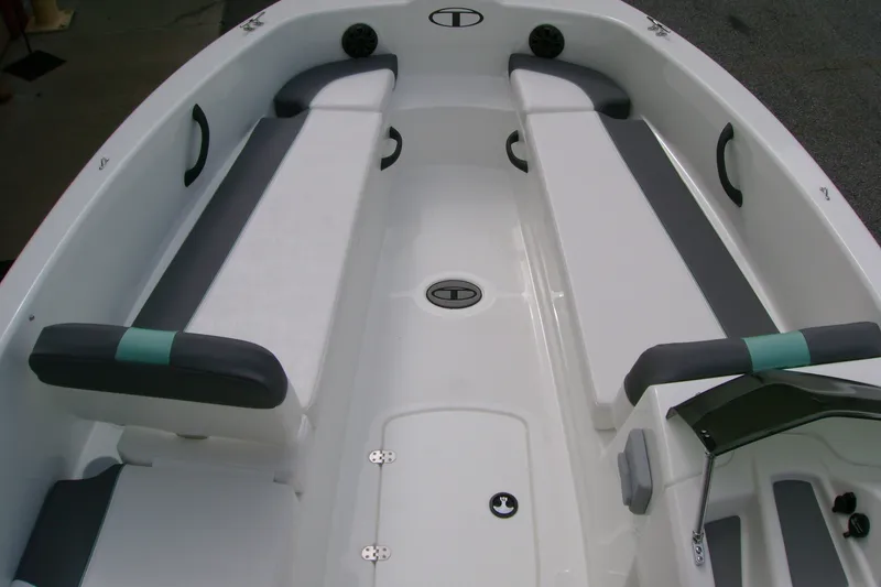 Slide: The Image of 2027 Tahoe T18 boat interior with gray and white seating, featuring modern design and spacious layout. - 10