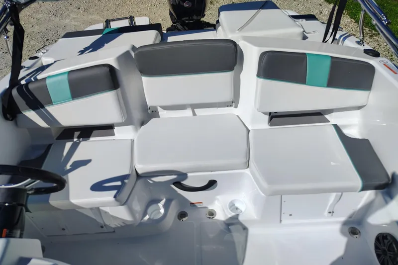 Slide: The Image of 2027 Tahoe T18 boat interior with modern seating and sleek design. - 7