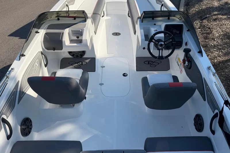 Slide: The Image of 2027 Tahoe T21 boat interior with dual seating and steering console. - 4