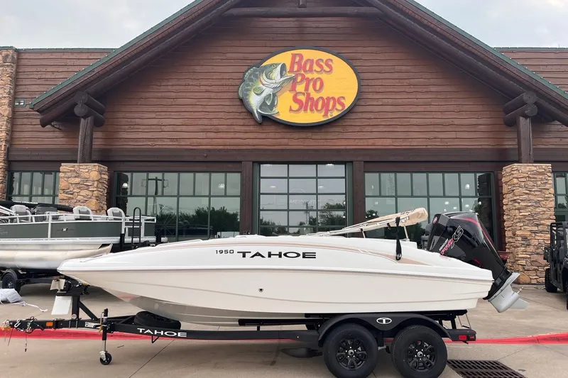 The Image of 2027 Tahoe 1950 boat displayed outside Bass Pro Shops store. - 0