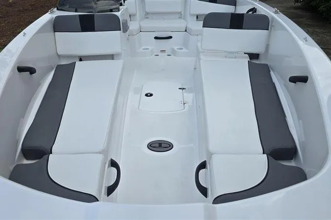 Slide: The Image of 2027 Tahoe T18 boat interior with white and gray seating arrangement. - 9