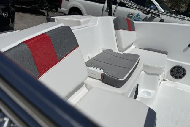 Slide: The Image of 2027 Tahoe T16 boat interior with gray and red seating, showcasing modern design. - 6