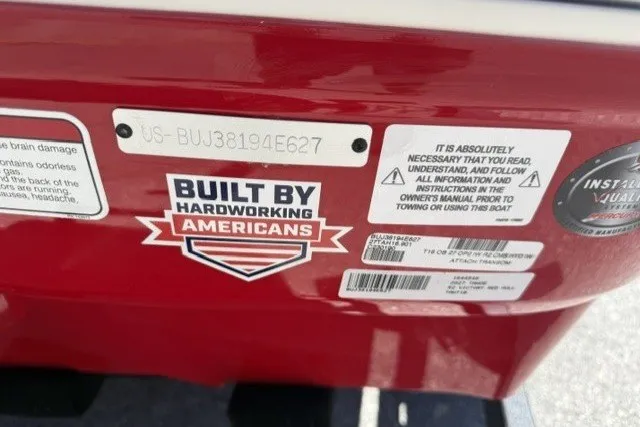 Slide: The Image of Red Tahoe T16 boat, 2027 model, with "Built by Hardworking Americans" sticker and safety instructions. - 9