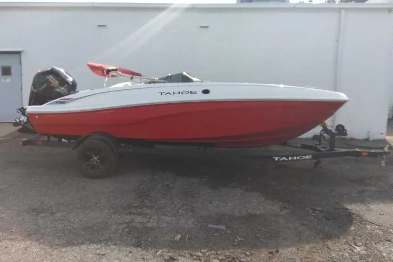 Slide: The Image of 2027 Tahoe T18 boat with red and white hull on a trailer. - 70