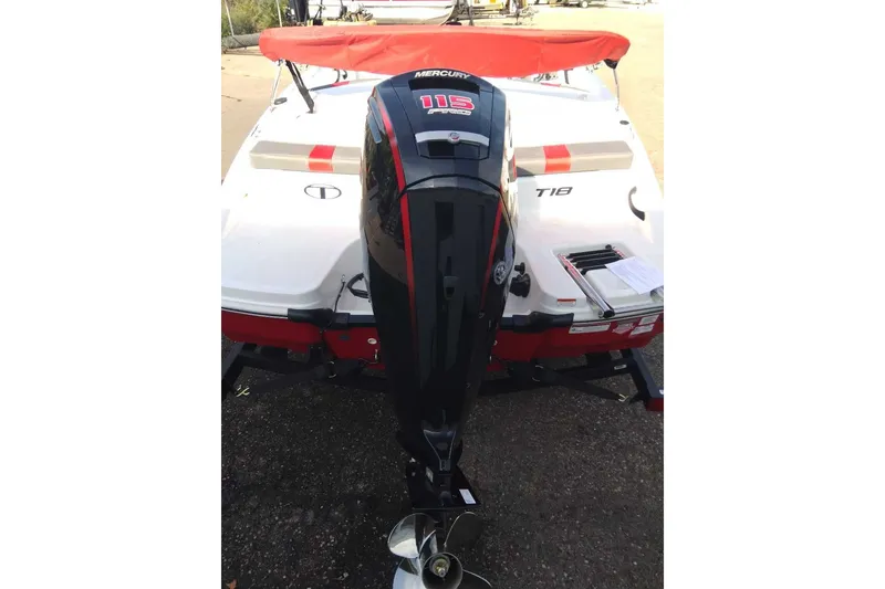 Slide: The Image of 2027 Tahoe T18 boat with Mercury 115 outboard motor, red and white design. - 6