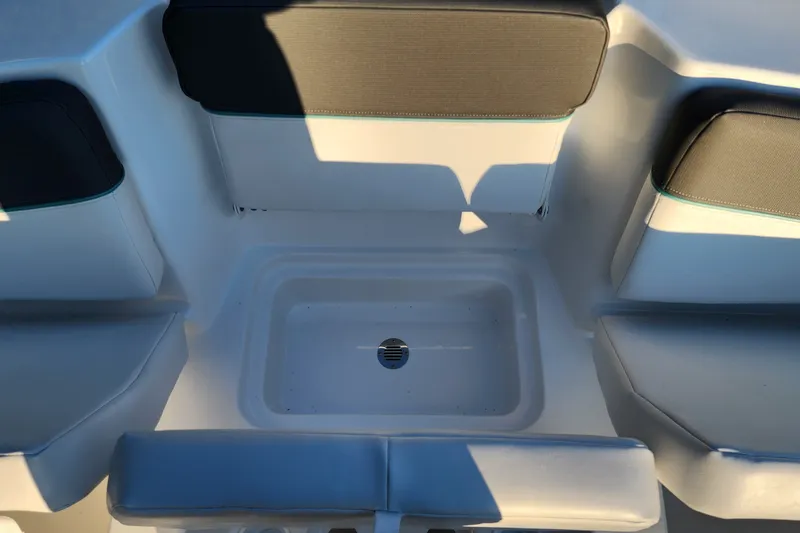 Slide: The Image of Interior seating of 2027 Tahoe T16 boat with drain feature. - 66