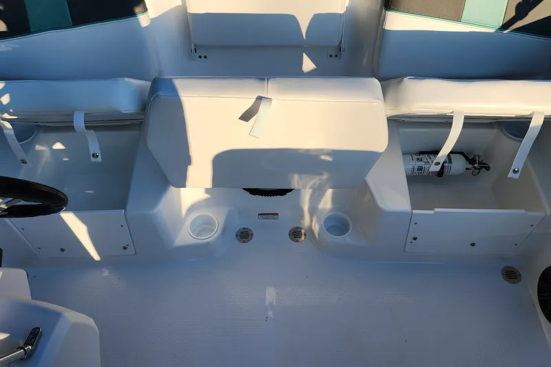 Slide: The Image of Interior of a 2027 Tahoe T16 boat featuring seating and storage compartments. - 5