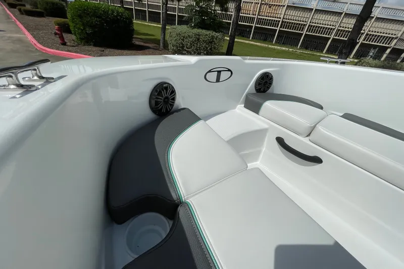 Slide: The Image of Interior of 2027 Tahoe T18 boat featuring sleek seating and built-in speakers. - 7