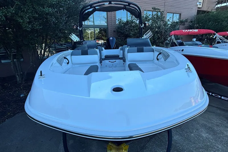 Slide: The Image of 2027 Tahoe T21 boat with sleek white design and comfortable seating. - 3