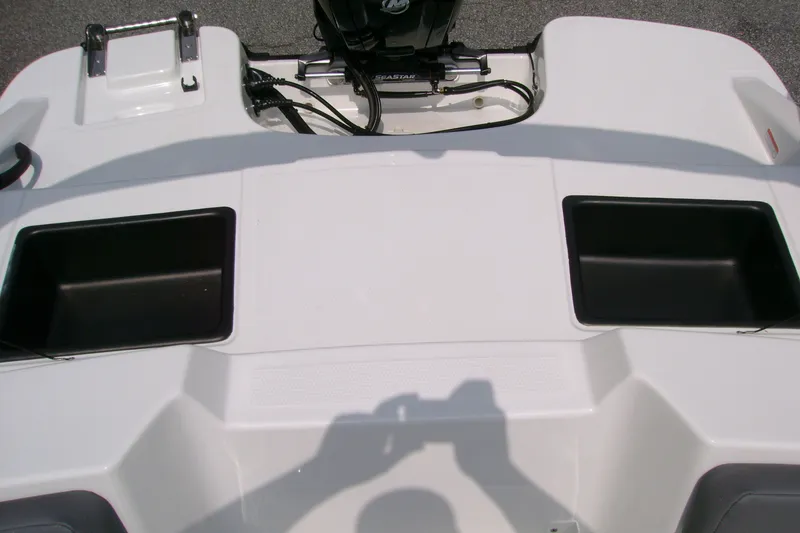 Slide: The Image of Rear view of 2027 Tahoe T16 boat with storage compartments and motor. - 11