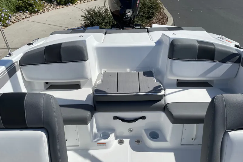 Slide: The Image of 2027 Tahoe T21 boat interior with sleek seating and modern design. - 12