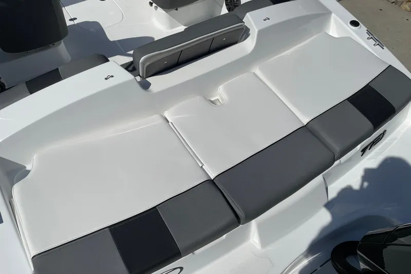 Slide: The Image of 2027 Tahoe T21 boat interior with sleek white and gray seating design. - 27