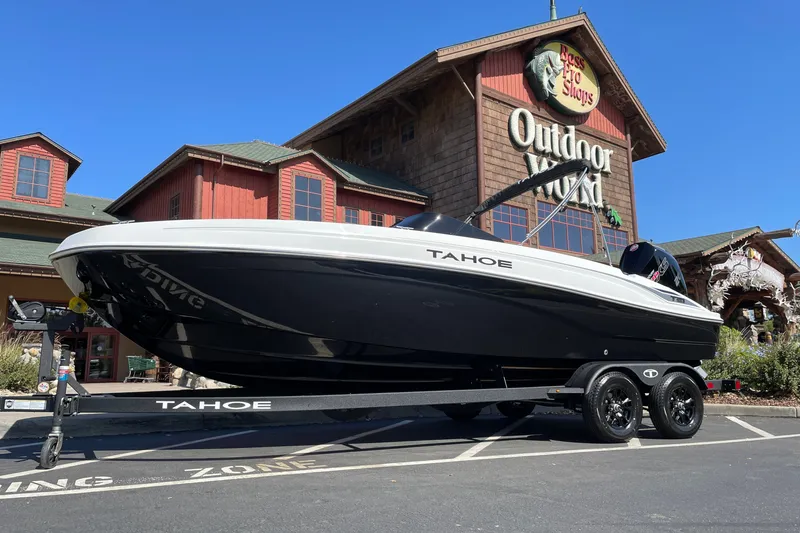 The Image of 2027 Tahoe T21 boat on trailer outside Bass Pro Shops Outdoor World. - 0