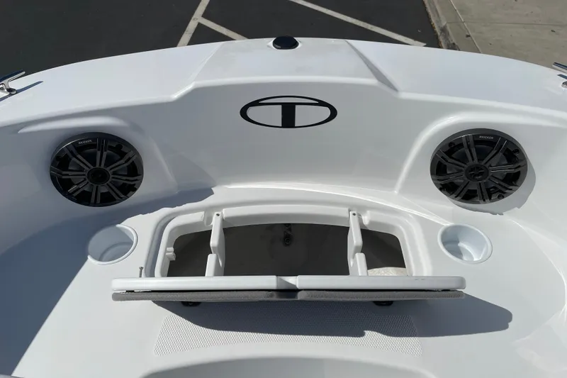 Slide: The Image of 2027 Tahoe T21 boat interior with speakers and storage compartment. - 25