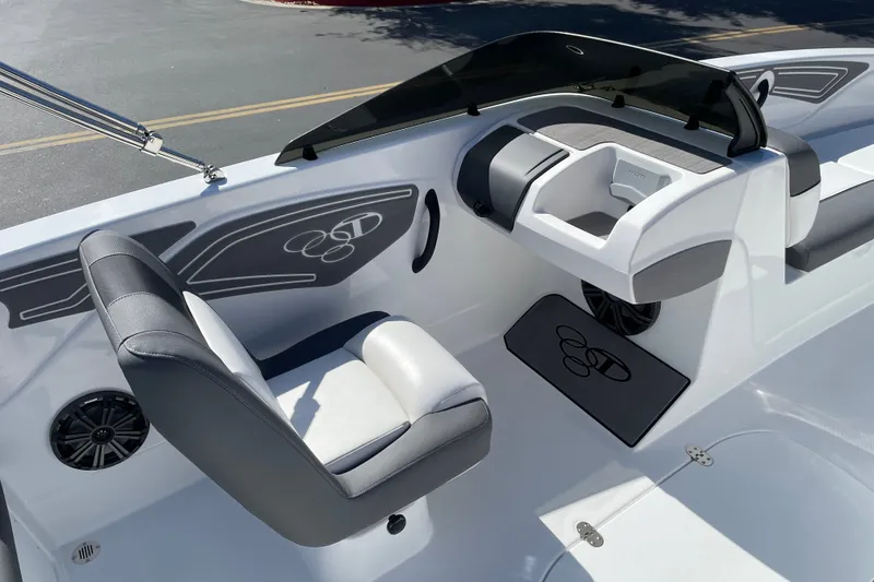 Slide: The Image of 2027 Tahoe T21 boat interior with sleek seating and modern dashboard design. - 11