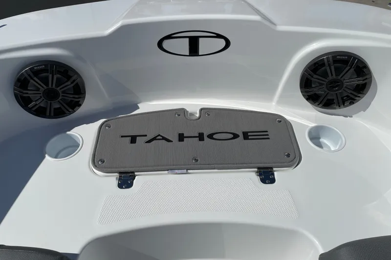 Slide: The Image of 2027 Tahoe T21 boat interior with speakers and branded panel. - 24