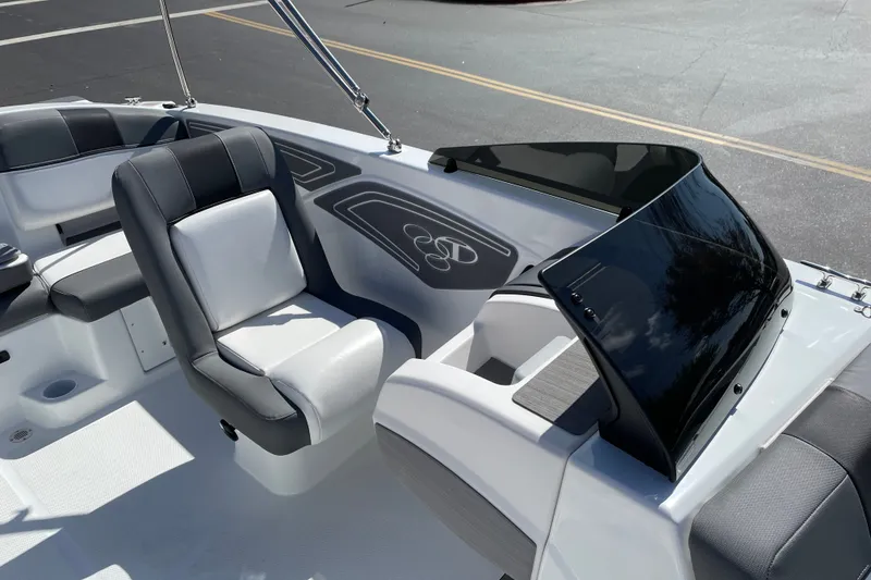 Slide: The Image of Interior of 2027 Tahoe T21 boat with sleek seating and modern dashboard design. - 8