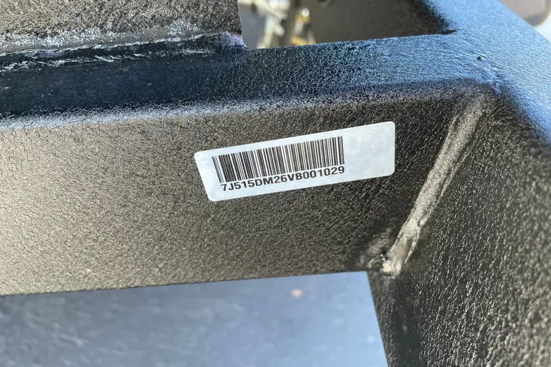 Slide: The Image of Barcode label on black metal frame, Tahoe T21 2027 model. - 119