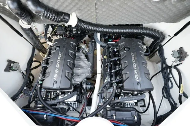 Slide: The Image of 2022 Yamaha 212 boat engine compartment with dual high-output engines. - 19