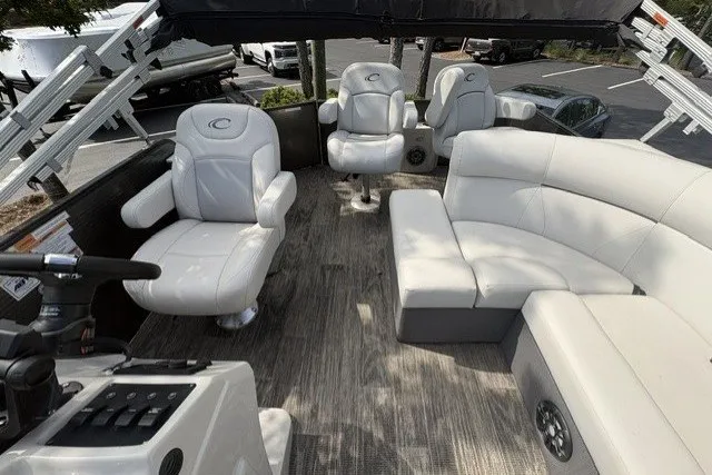 Slide: The Image of 2022 Crest CLASSIC FISH 220SF boat interior with plush seating and modern design. - 9
