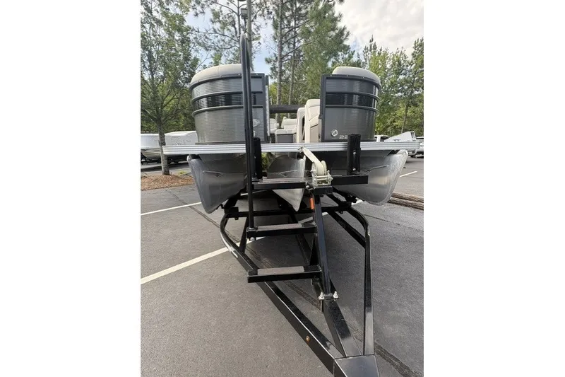 Slide: The Image of 2022 Crest CLASSIC FISH 220SF pontoon boat on trailer in parking lot. - 6