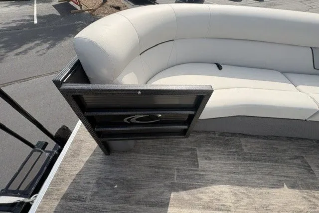 Slide: The Image of 2022 Crest CLASSIC FISH 220SF boat interior with plush seating and modern design. - 8