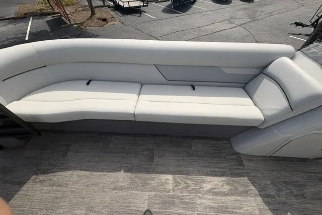 Slide: The Image of 2022 Crest Classic Fish 220SF boat interior with sleek, modern seating design. - 12