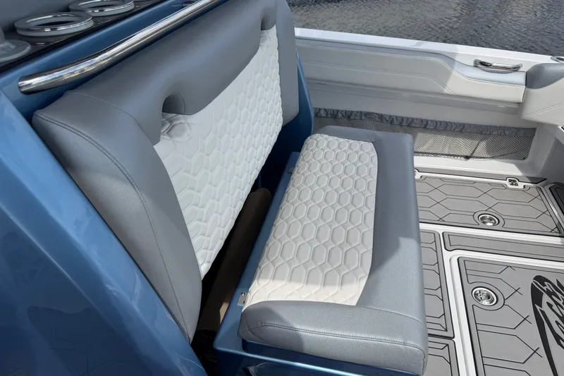 Slide: The Image of 2022 Nor-Tech 340 Sport boat interior with stylish seating and modern design. - 29