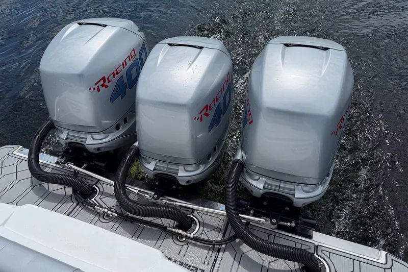 Slide: The Image of Triple Mercury Racing 400 outboard engines on a 2022 Nor-Tech 340 Sport boat. - 15