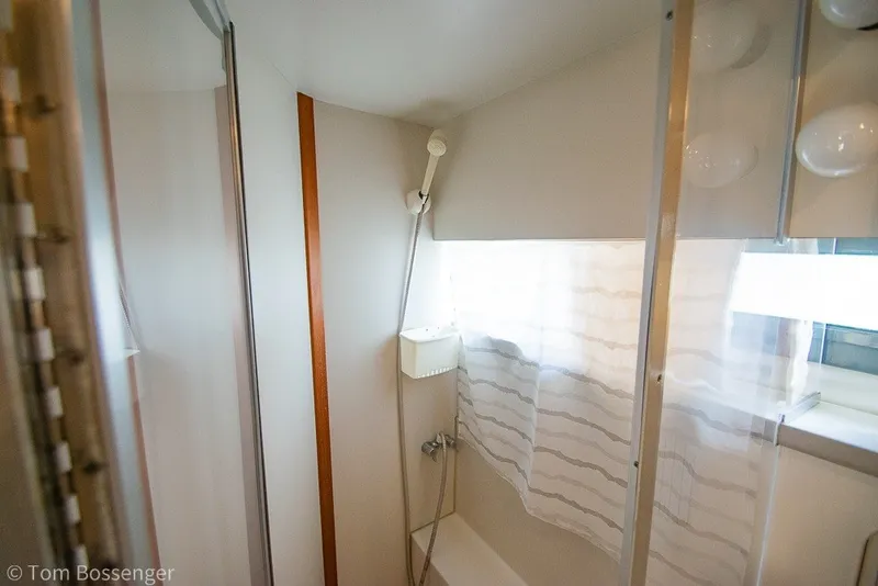 Slide: The Image of Shower area in 1994 Carver 370 Aft Cabin Motor Yacht with curtain and showerhead. - 27