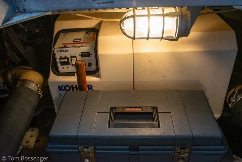 Slide: The Image of Engine room of 1994 Carver 370 Aft Cabin Motor Yacht with Kohler generator and toolbox. - 50