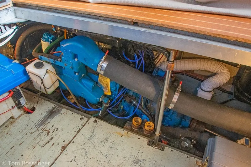Slide: The Image of Engine compartment of a 1994 Carver 370 Aft Cabin Motor Yacht, showcasing mechanical components. - 48