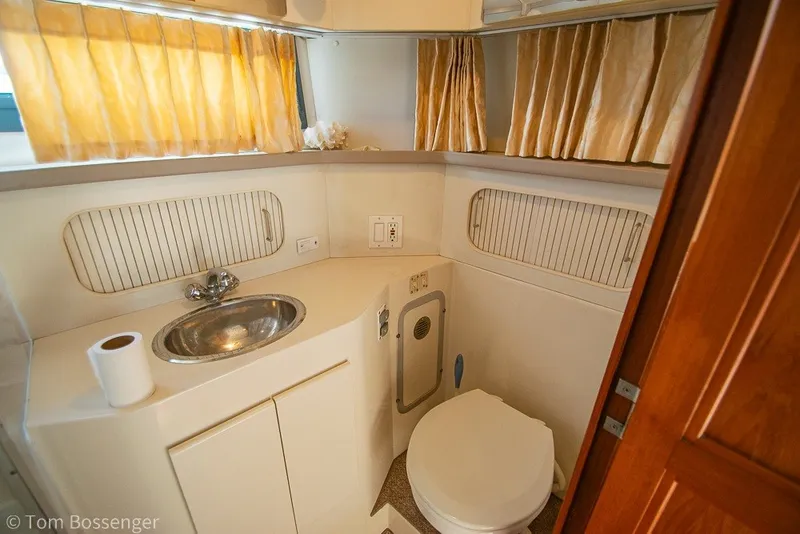 Slide: The Image of Bathroom interior of 1994 Carver 370 Aft Cabin Motor Yacht with sink and toilet. - 26