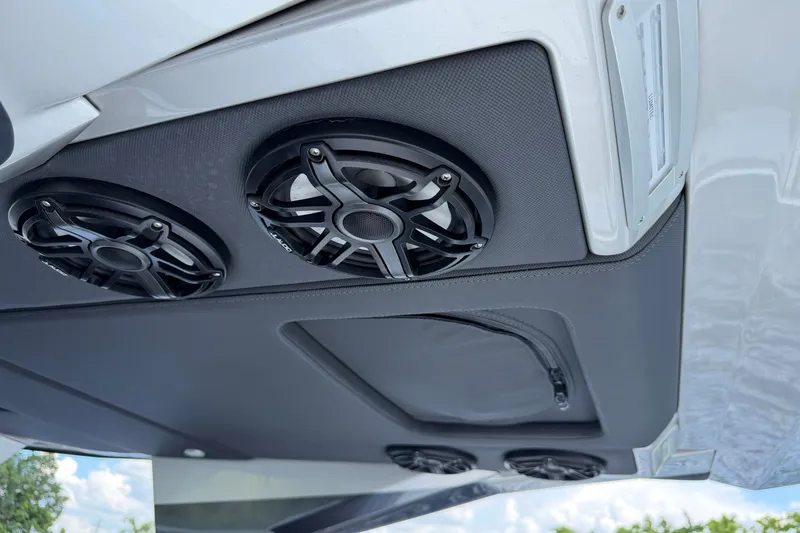 Slide: The Image of 2020 Nor-Tech boat speakers and storage compartment on the ceiling. - 35